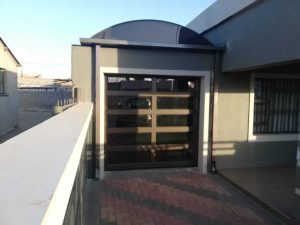 Single Garage Door With Slatt Glass
